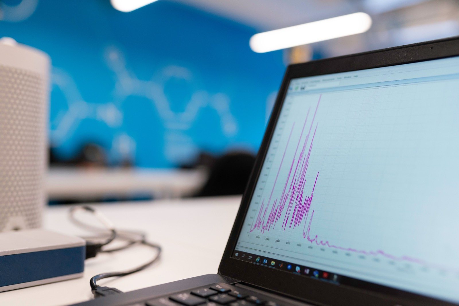 Laptop displaying a data analytics graph representing link performance tracking